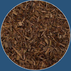 Auburn mulch for landscaping, featuring a rich reddish-brown color for garden beds.